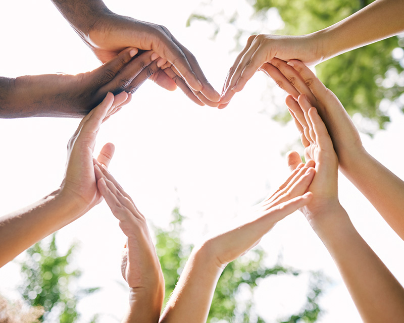 Hands forming the shape of a heart